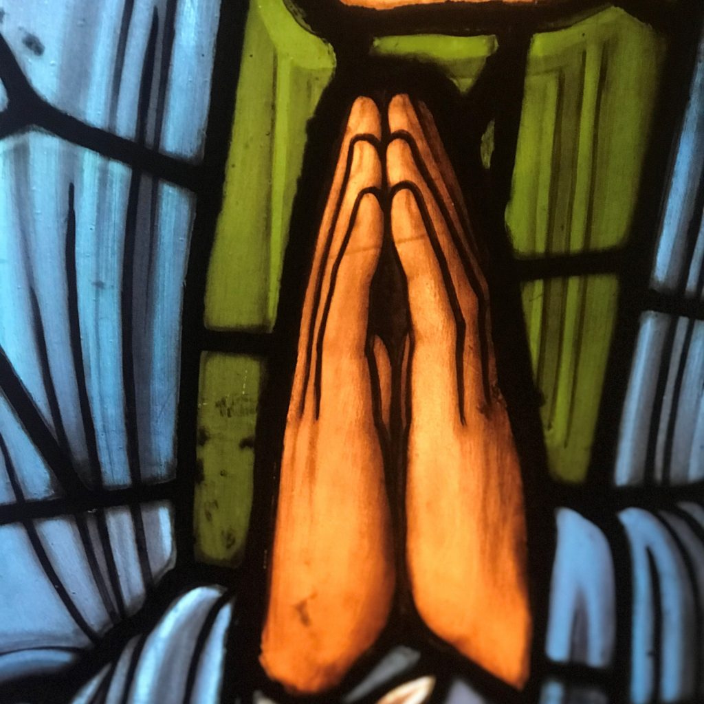 Praying hands section from The Ascension window.